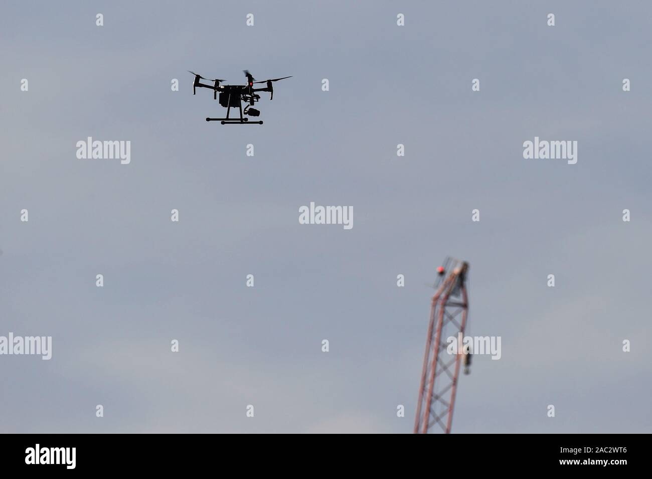 London, UK.  30 November 2019.  A police drone flies above London Bridge. The previous day, a man, now identified by Metropolitan Police as Usman Khan, who had been released from jail after being convicted of terror offences, was shot by police on London Bridge near Fishmongers' Hall after killing a man and a woman.  London Bridge was closed and people ordered to evacuate abandon their vehicles on the bridge.  Credit: Stephen Chung / Alamy Live News Stock Photo