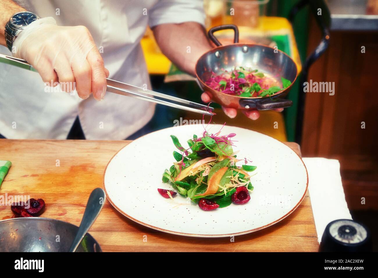 Professional chef is making vegetable appetizer, toned image Stock ...