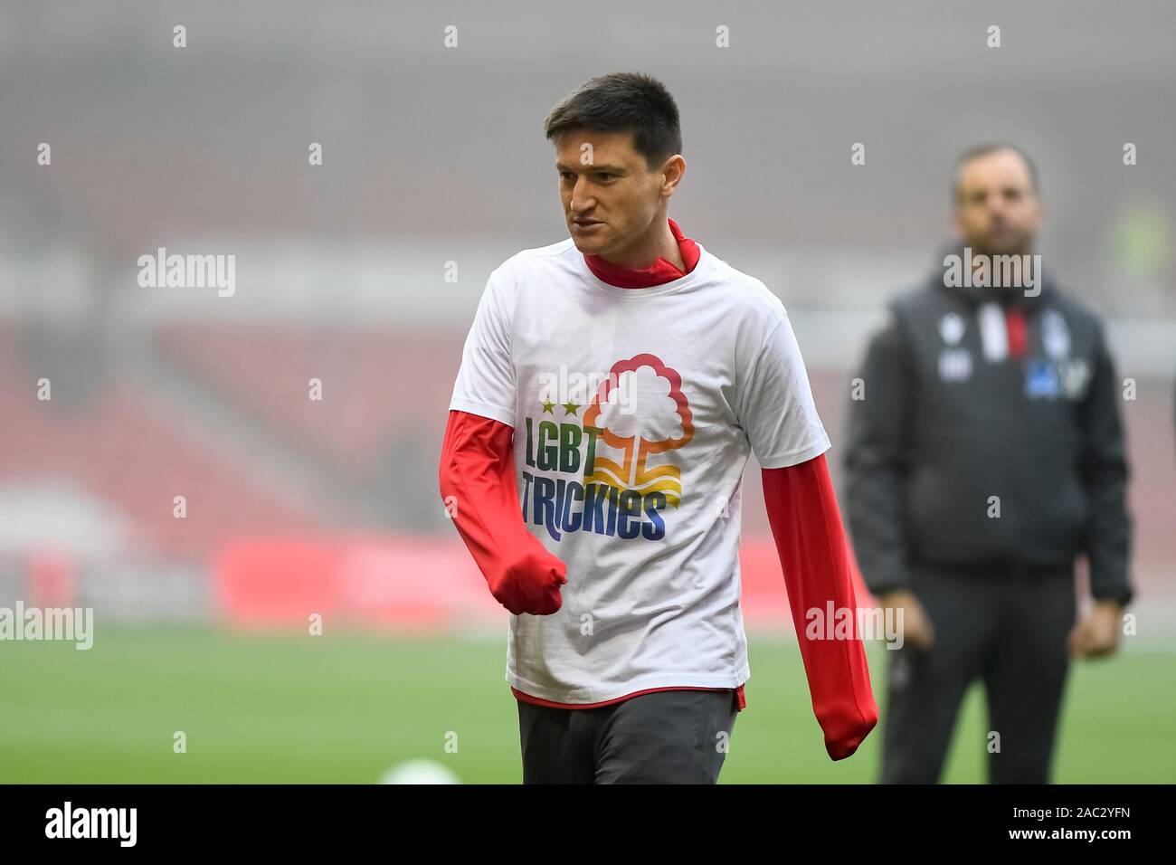 Nottingham, UK. 30th Nov, 2019. Joe Lolley (23) of Nottingham Forest warms up with LBGT Trickies logo, showing support for the LBGT community during the Sky Bet Championship match between Nottingham Forest and Cardiff City at the City Ground, Nottingham on Saturday 30th November 2019. (Credit: Jon Hobley | MI News) Photograph may only be used for newspaper and/or magazine editorial purposes, license required for commercial use Credit: MI News & Sport /Alamy Live News Credit: MI News & Sport /Alamy Live News Credit: MI News & Sport /Alamy Live News Stock Photo