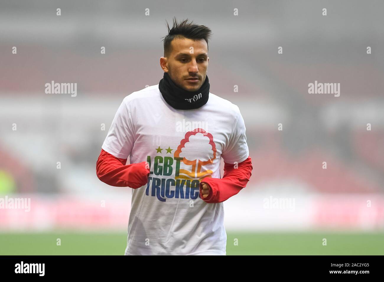 Nottingham, UK. 30th Nov, 2019. Joao Carvalho (10) of Nottingham Forest warms up with LBGT Trickies logo, showing support for the LBGT community during the Sky Bet Championship match between Nottingham Forest and Cardiff City at the City Ground, Nottingham on Saturday 30th November 2019. (Credit: Jon Hobley | MI News) Photograph may only be used for newspaper and/or magazine editorial purposes, license required for commercial use Credit: MI News & Sport /Alamy Live News Credit: MI News & Sport /Alamy Live News Credit: MI News & Sport /Alamy Live News Stock Photo
