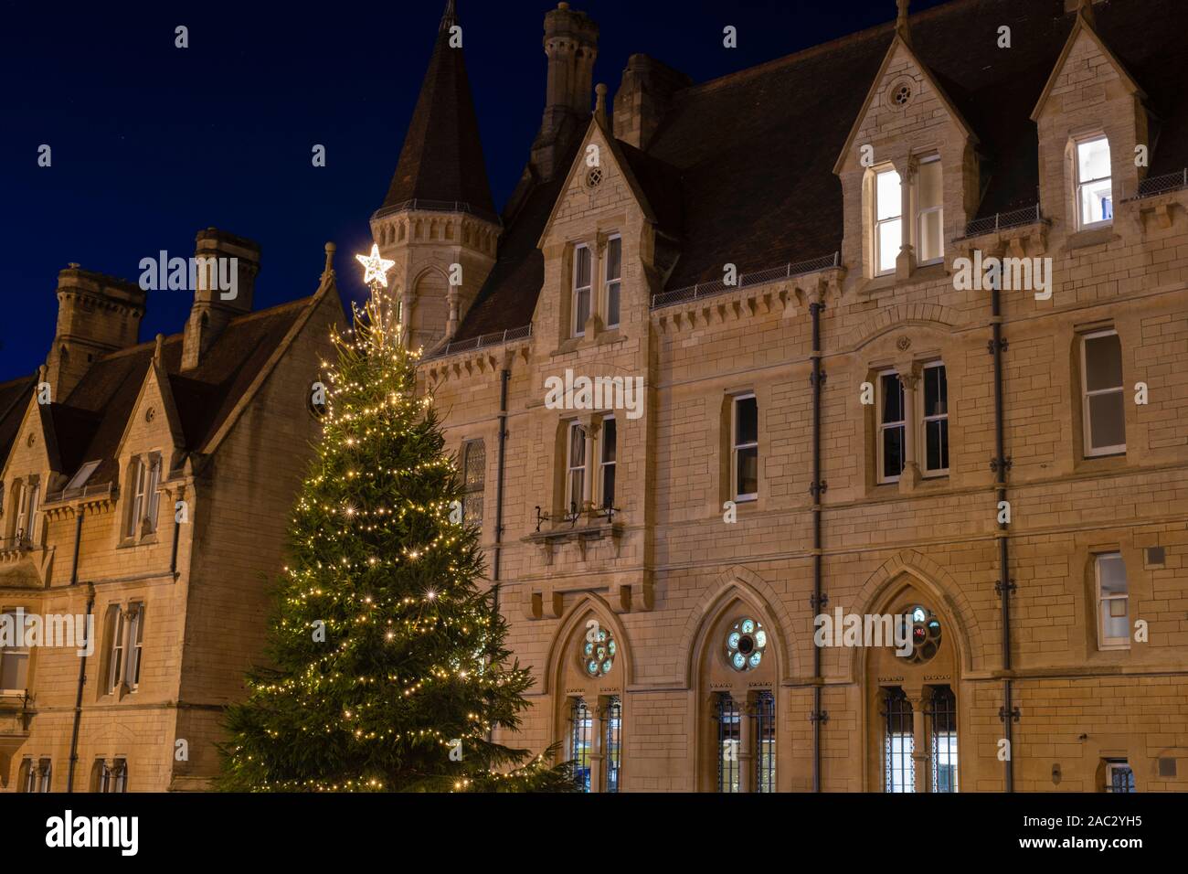 Christmas tree in broad street at night. Oxford, Oxfordshire, England Stock Photo