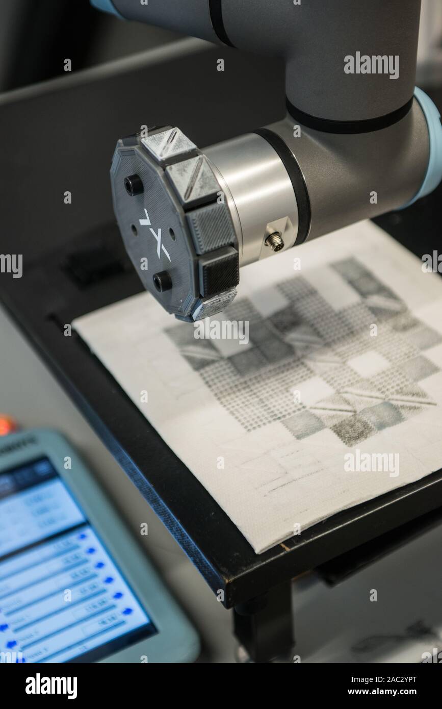 Developing of a robot programmed to execute ink stamps. Indexlab, digital design and fabrication laboratory, Politecnico di Milano, Lecco, Italy - Nov Stock Photo