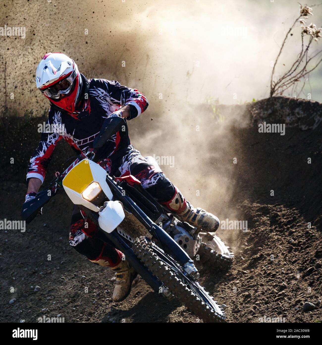 moto cross in action in dirt road Stock Photo