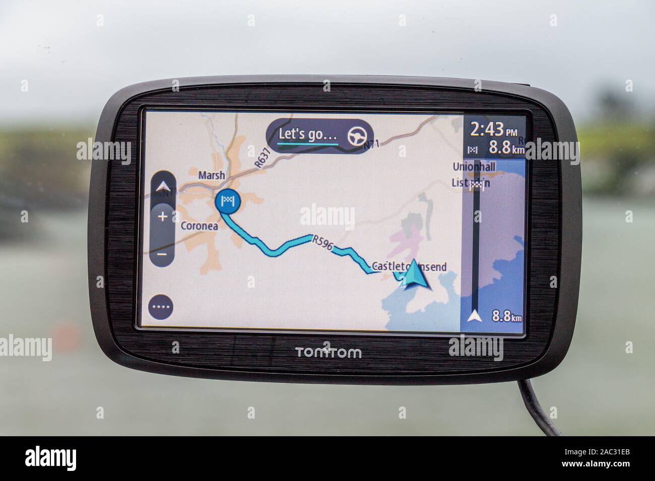 Satellite navigation system display on car windscreen Stock Photo