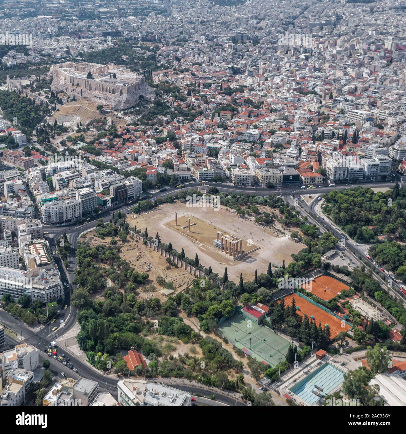 Aerial drone shot of Acropolis of Athens, Olympion Zeus temple, national garden and museum Stock Photo