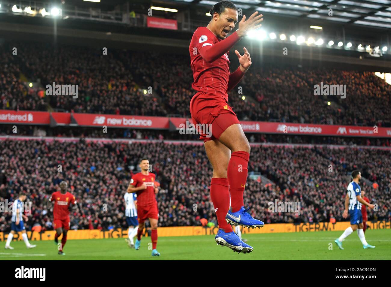 Liverpool s Virgil van Dijk celebrates scoring his second sides goal during the Premier League match at Anfield Liverpool Stock Photo Alamy