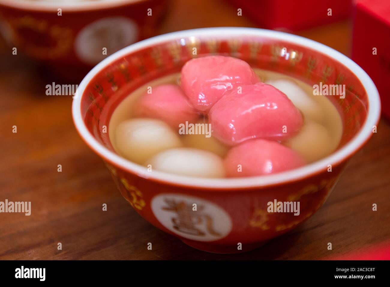 Tangyuan or tang yuan ( Chinese sweetheart soup) is a Chinese dessert made from glutinous rice flour mixed with a small amount of water to form balls Stock Photo