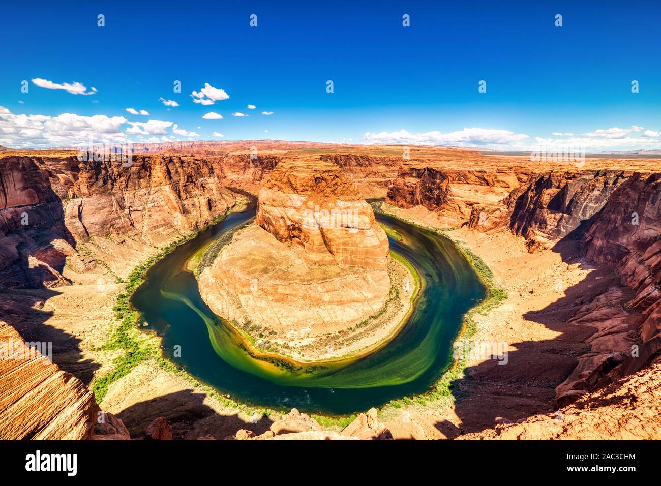 Horseshoe Bend on Colorado River with Bright Blue Sky, Utah Stock Photo ...