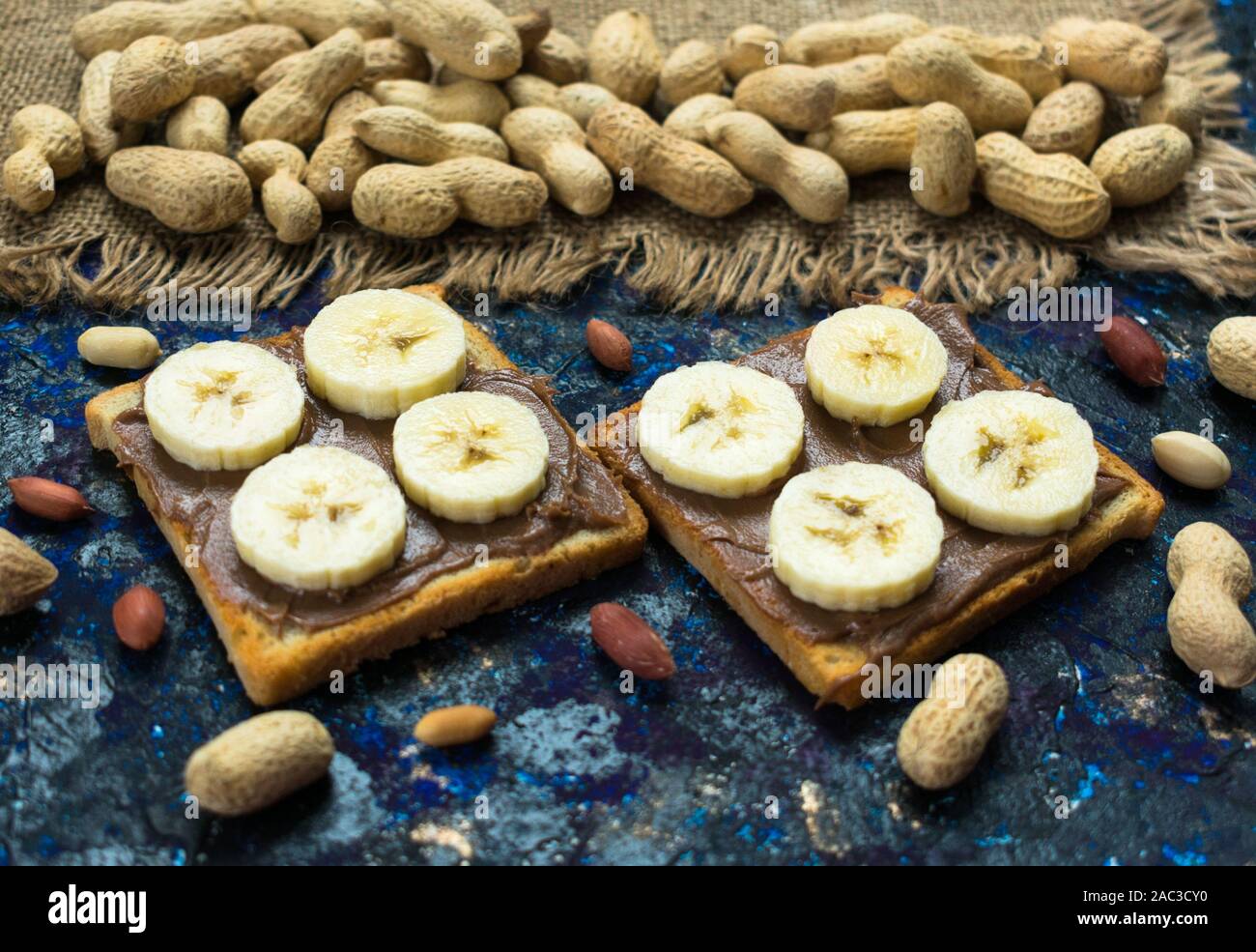 Toast with chocolate peanut butter and banana. Stock Photo
