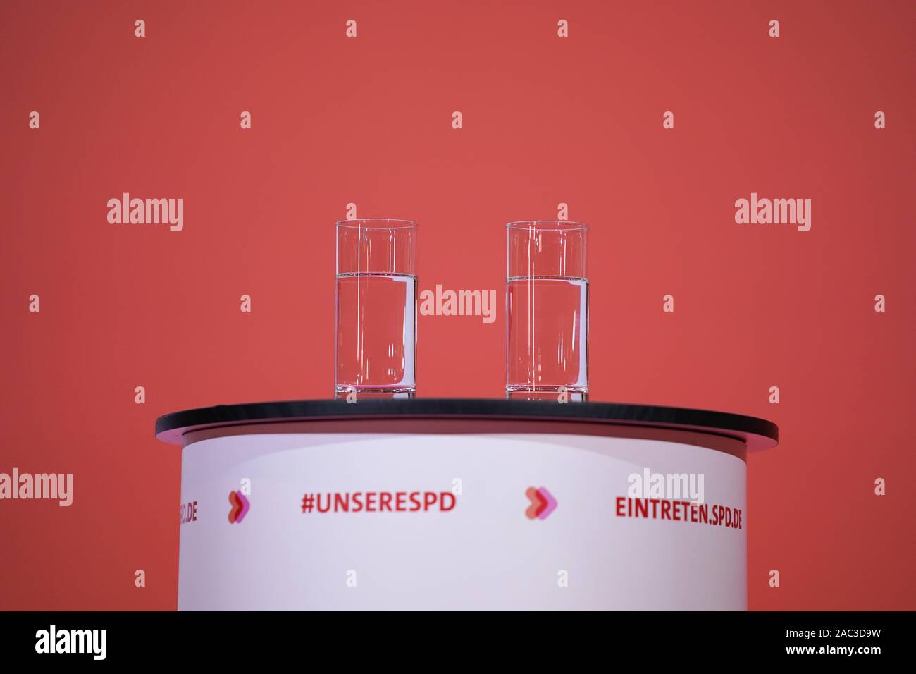Berlin, Germany. 30th Nov, 2019. Two glasses of water are on the speaker's podium at the announcement of the result of the vote on the SPD chairmanship in the Willy Brandt House. Credit: Kay Nietfeld/dpa/Alamy Live News Stock Photo