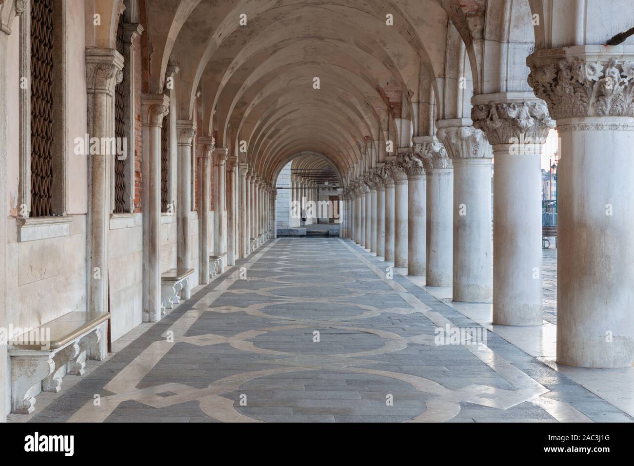 Venice - Exterior corridor of Doge palace in the morning. Stock Photo