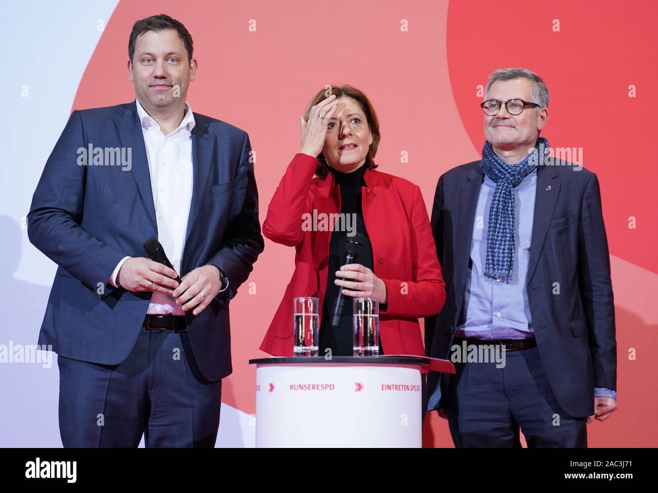 Berlin, Germany. 30th Nov, 2019. Lars Klingbeil (l-r), Secretary General of the SPD, Malu Dreyer, provisional SPD Chairwoman, and Dietmar Nietan, SPD Treasurer, are on the podium at the announcement of the result of the vote on the SPD chairmanship in the Willy Brandt House. Walter-Borjans and Esken have won the vote. The new leadership will be confirmed at the party conference on December 6. Credit: Kay Nietfeld/dpa/Alamy Live News Stock Photo