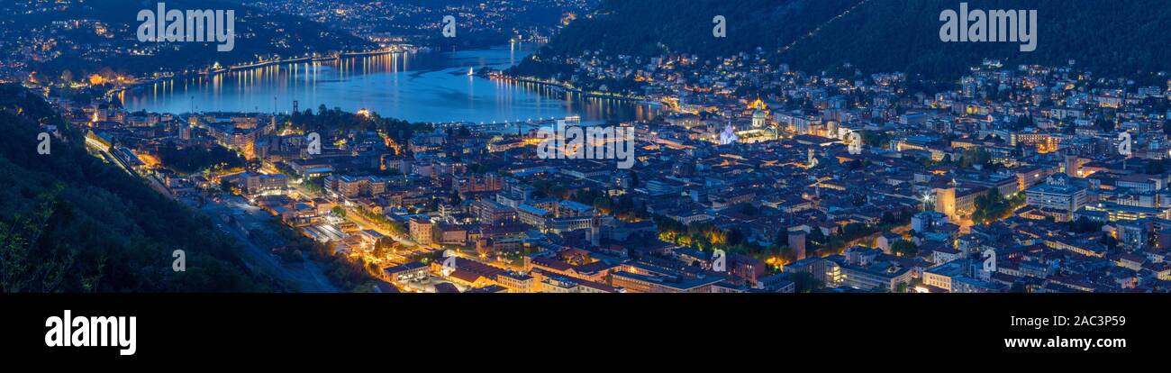 Como - The city with the Cathedral and lake Como at dusk. Stock Photo