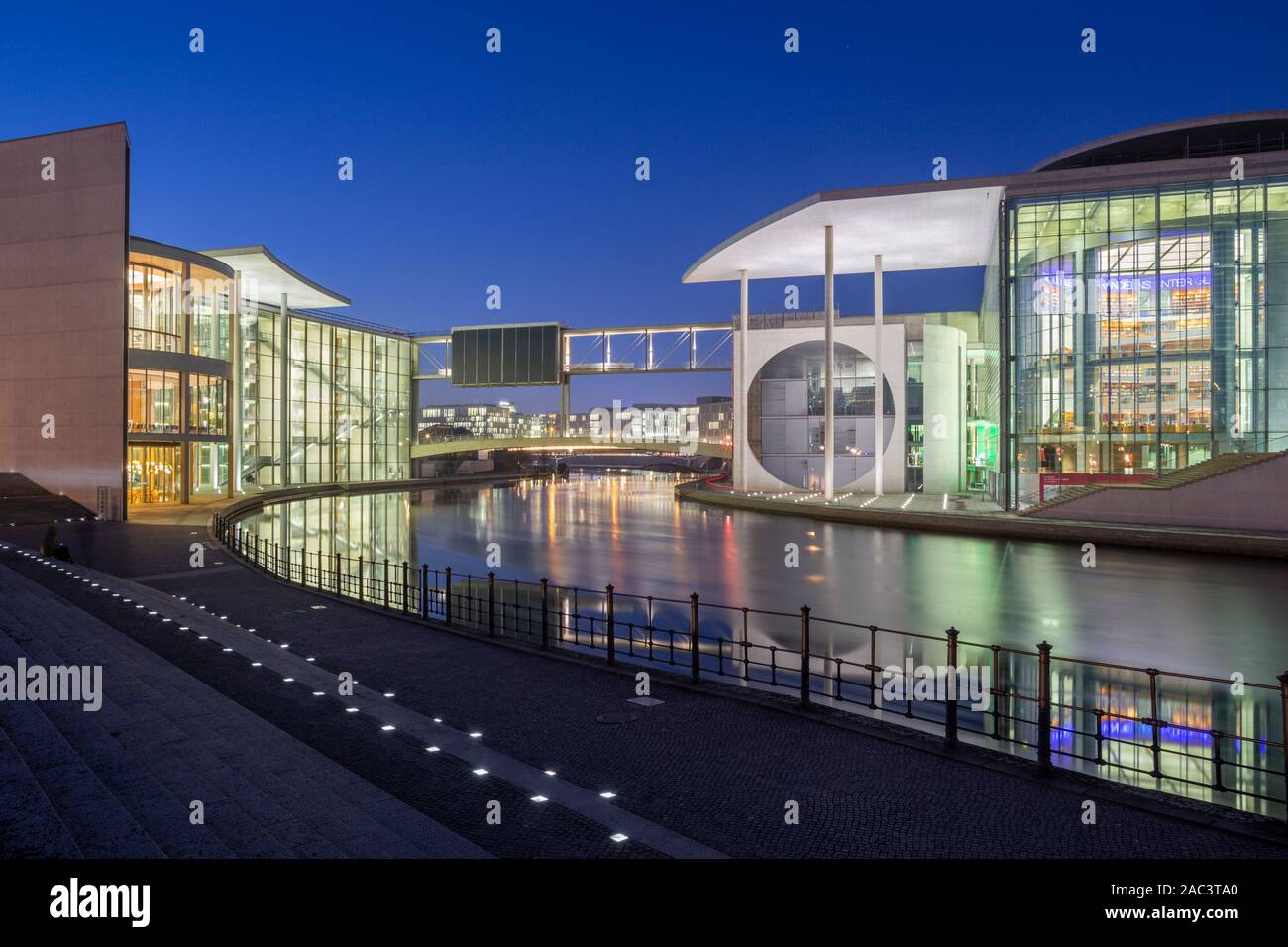 BERLIN, GERMANY, FEBRUARY - 16, 2017: Panorama of modern Government buildings over the Spree river in evening dusk. Stock Photo
