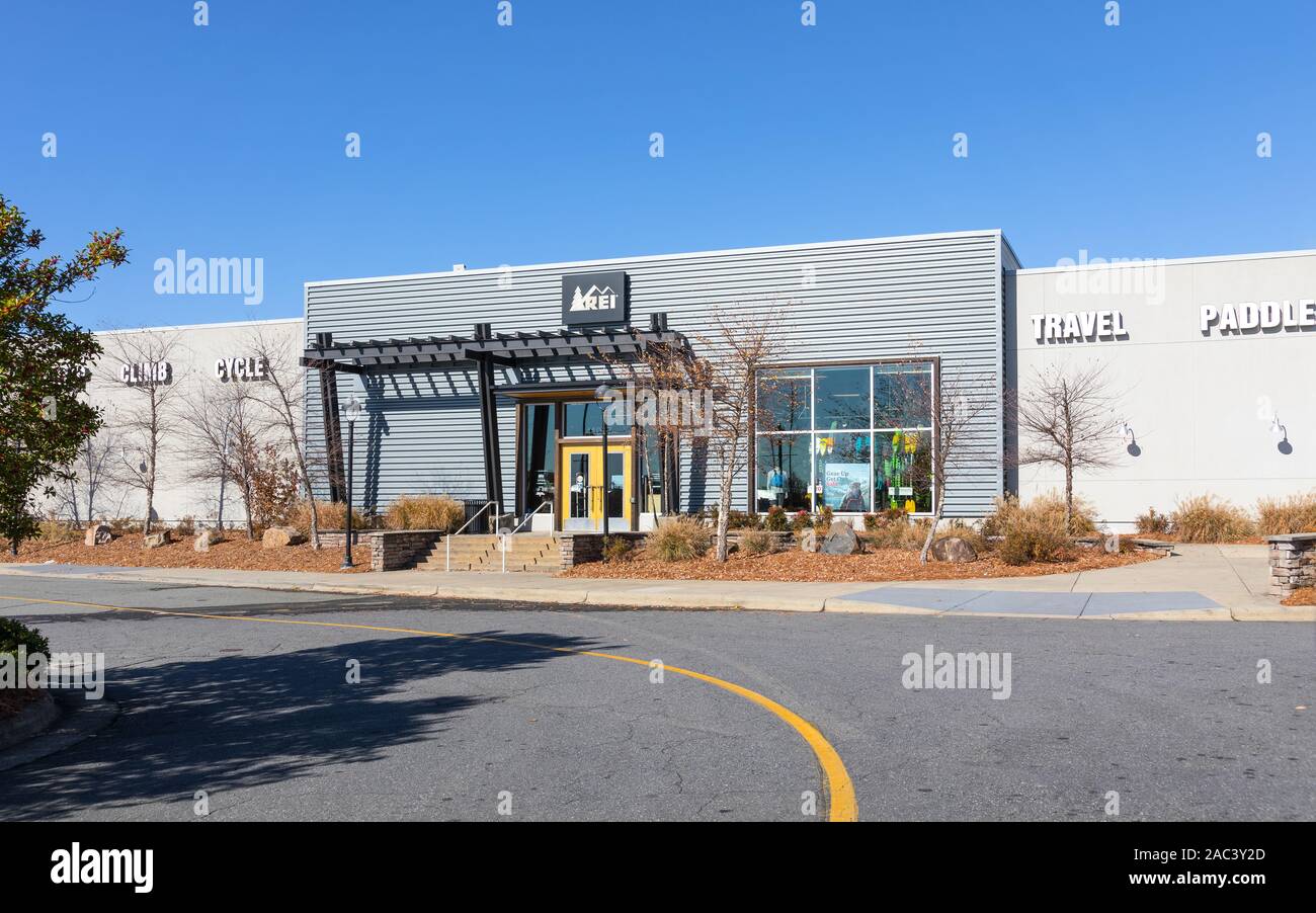 PINEVILLE, NC, USA-24 NOV 2019: A REI store front and entrance.  REI is a retailer of outdoor gear and sporting goods. Stock Photo
