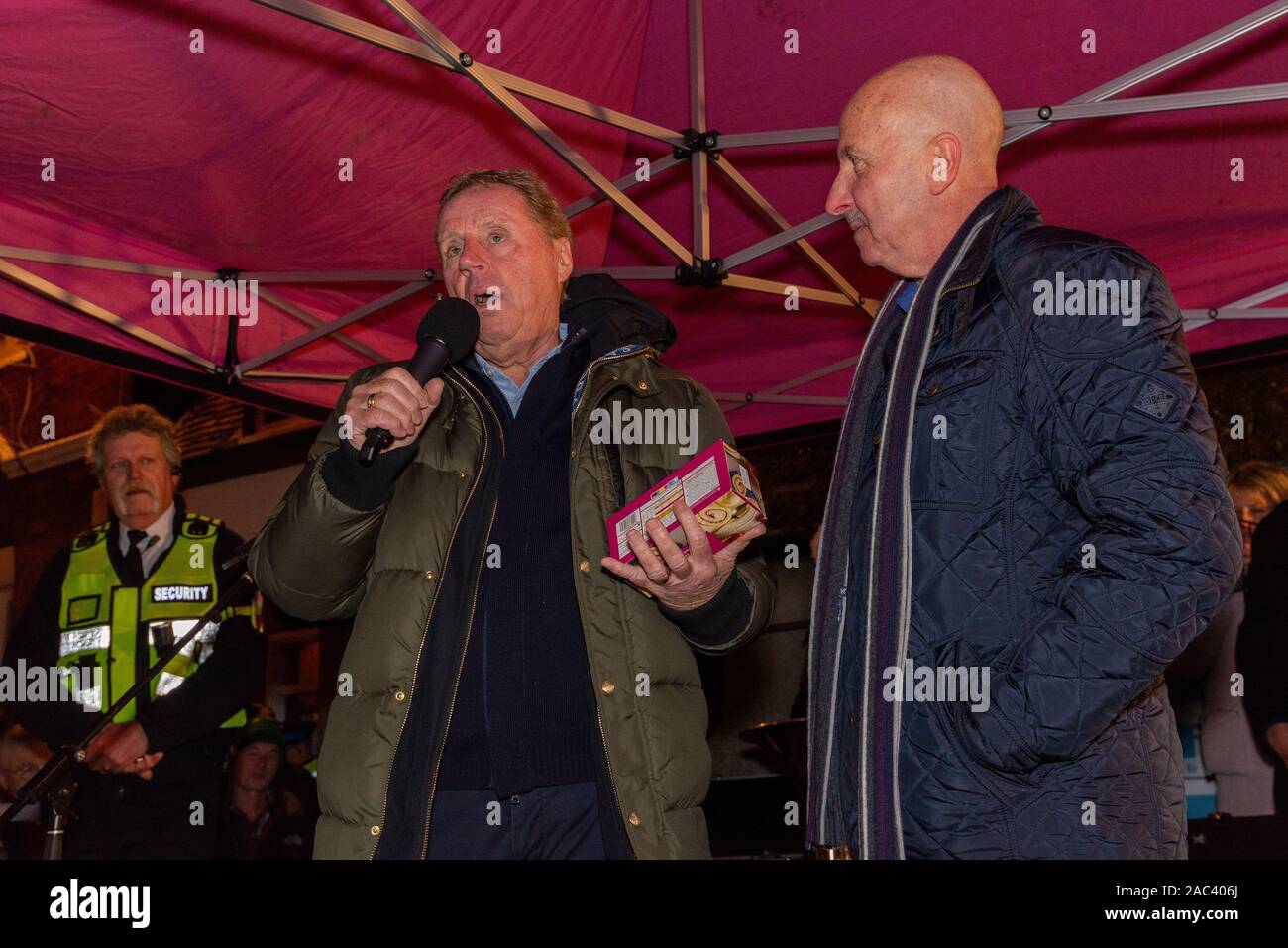 Harry Redknapp, Fordingbridge, New Forest, Hampshire, England, UK. 30th November, 2019. The town Christmas lights are turned on by King of the Jungle, former football manager and local celebrity. Crowds pack the High Street to hear Mr Redknapp's anecdotes about the town before watching him throw the switch to officially start the festive period. Stock Photo