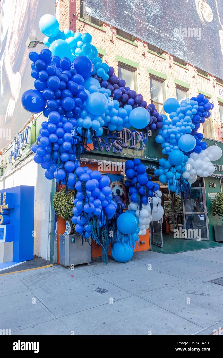 New York, NY - November 30, 2019: Happy Paws shop participates in celebrating 10th annual small business Saturday at 316 Lafayette Street Stock Photo