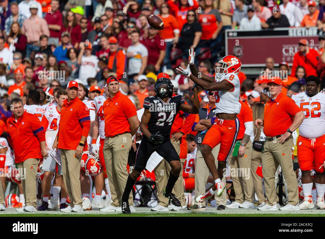 Columbia, SC, USA. 30th Nov, 2019. South Carolina Gamecocks defensive back Israel Mukuamu (24) watches the catch by Clemson Tigers wide receiver Justyn Ross (8) in the NCAA matchup at Williams-Brice Stadium in Columbia, SC. (Scott Kinser/Cal Sport Media). Credit: csm/Alamy Live News Stock Photo