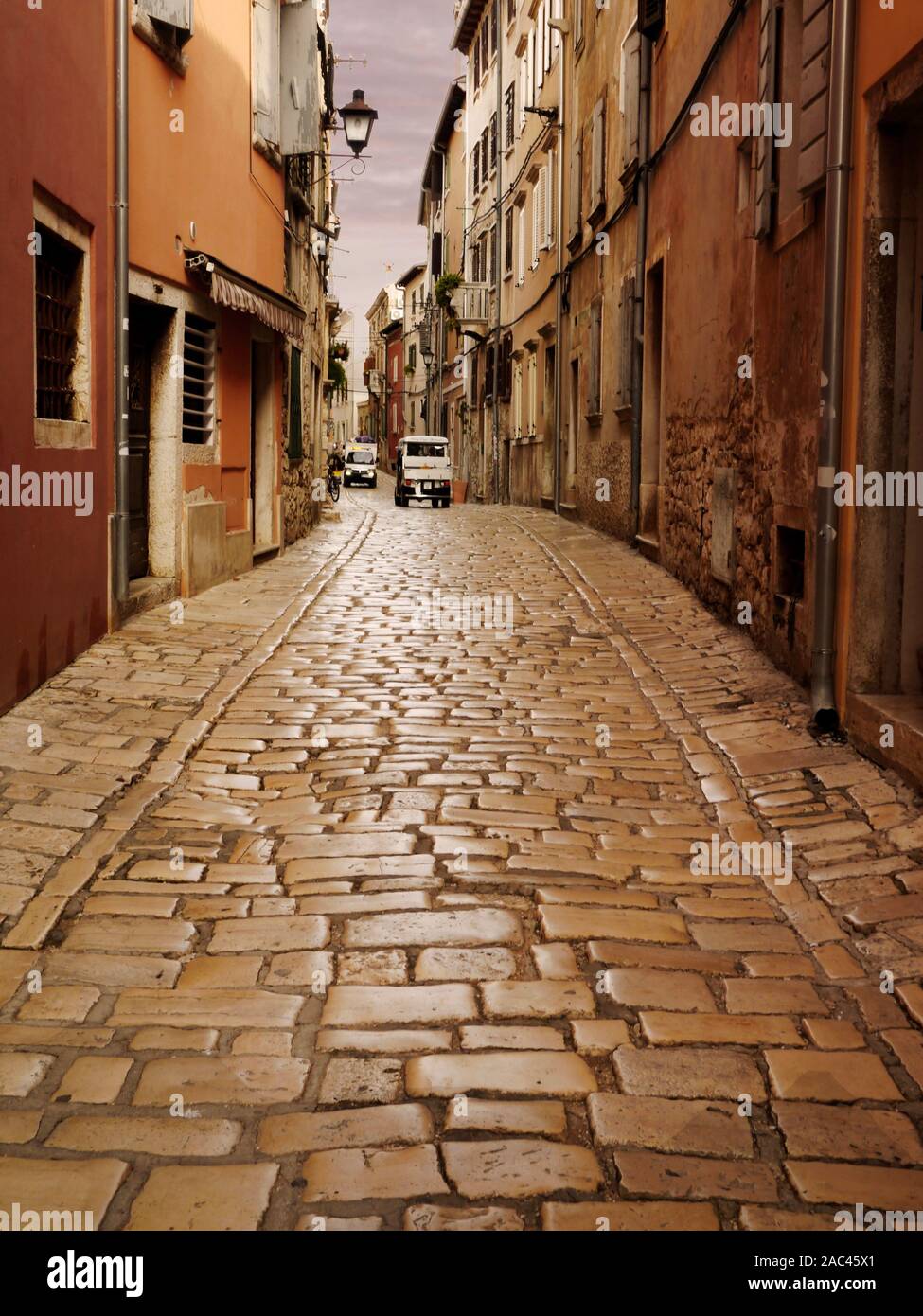 Old town narrow cobblestone street in Rovinj, Croatia on Istria Peninsula. Stock Photo