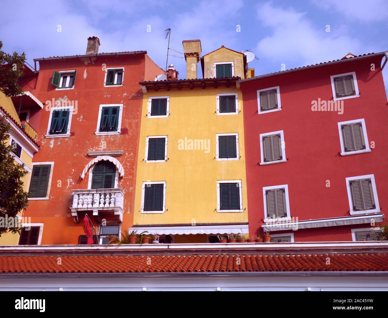 Colorful exterior buildings around historic medieval old town Rovinj, Croatia, Europe. Stock Photo