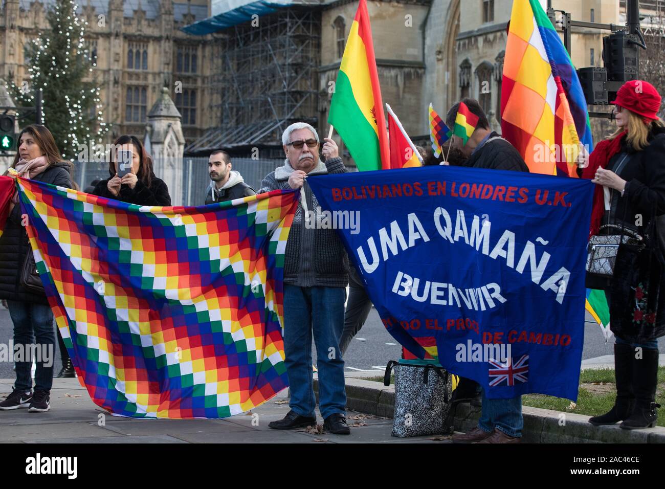 London, UK. 30 November, 2019. Activists from Bolivia Solidarity Campaign (BSC), joined by Plataforma 12 de Octubre (P12O) and other organisations, take part in an international protest in solidarity with the Plurinational State of Bolivia against the ousting by means of a military coup of Evo Morales, its first indigenous President, and the subsequent massacre of indigenous people protesting against the military takeover. Credit: Mark Kerrison/Alamy Live News Stock Photo