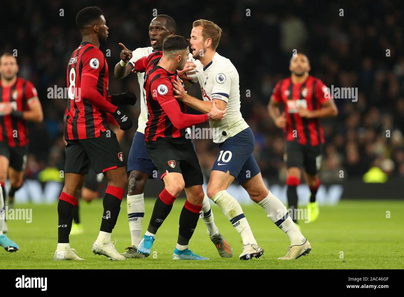 Tottenham's forward Harry Kane gets upset with Bournemouth's midfielder Jefferson Lerma during the Barclays Premier League match between Tottenham Hotspur and Bournemouth at the Tottenham Hotspur Stadium, London, England. On the 30th November 2019. (Photo by AFS/Espa-Images) Stock Photo