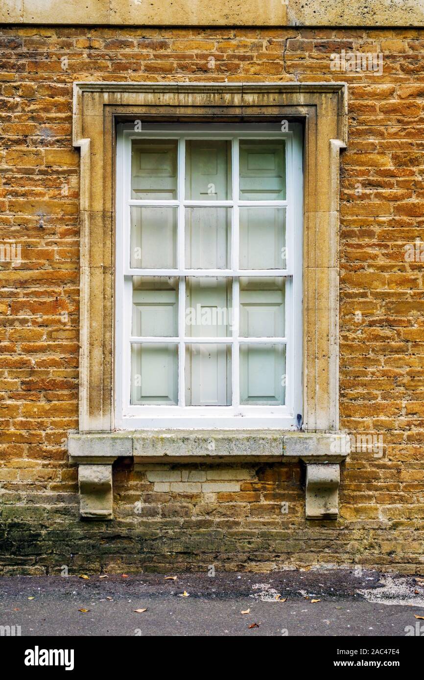 old stone wall with window in england uk on sunny evening Stock Photo ...