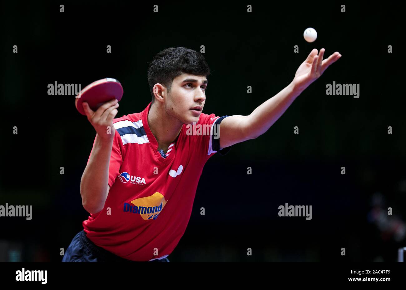 Kanak Jha of the US is in action against Lee Sangsu of South Korea
