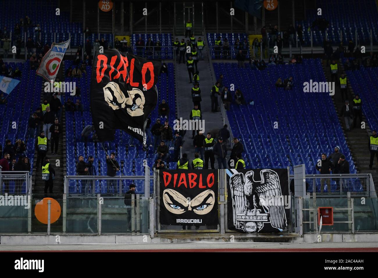 Lazio Fans With Diablo S Flag And Banner Roma 28 11 2019 Stadio Olimpico Football Europa League 2019 2020 Ss Lazio Cfr Cluji Photo Andrea Staccio Stock Photo Alamy