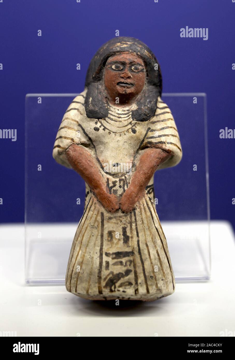 Shabti of the Lady Muntforte. Egyptian faience. 19th-20th dynasty (1295-1069 BC). New Kingdom. Naples, National Archaeological Museum. Stock Photo