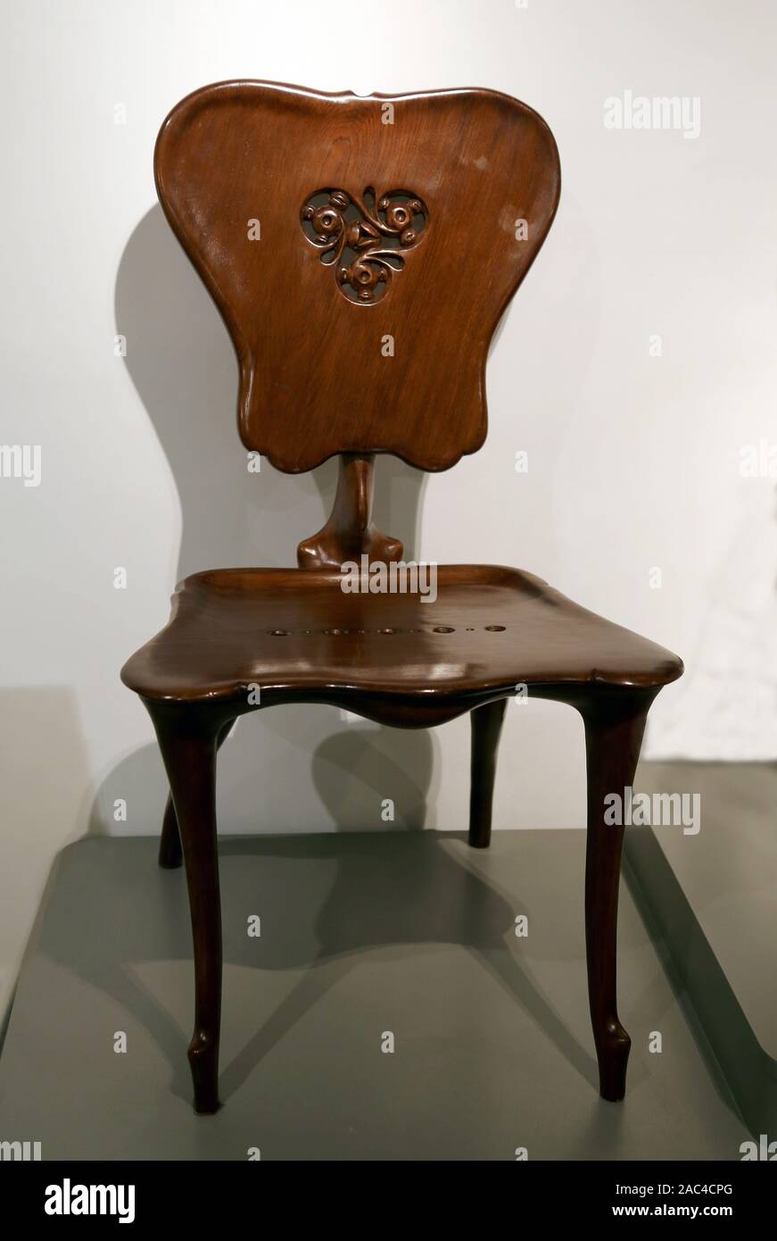 Meeting room chair of Casa Calvet. Varnished Solid oak, 1899. Design by Antoni Gaudí (1852-1926).  Barcelona. Stock Photo