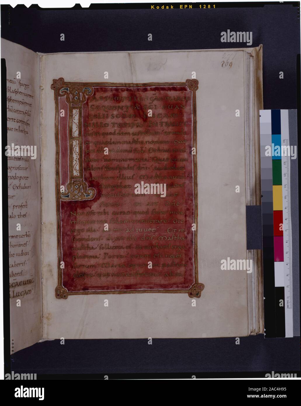 Gold text on purple background in gold frame Large decorated initial I Text for the Assumption Listed in De Ricci, Seymour, Census of Medieval and Renaissance Manuscripts in the United States and Canada. New York. N.Y.: H.W. Wilson, 1935; and Supplement, New York, N.Y.: Bibliographical Society of America, 1962. Citation/reference : De Ricci, 1315. De Ricci, 1315.  Chart by Dr. G.B. Guest.  Library dossierGold text on purple background in gold frame.  Large decorated initial I.  Text for the Assumption. Stock Photo