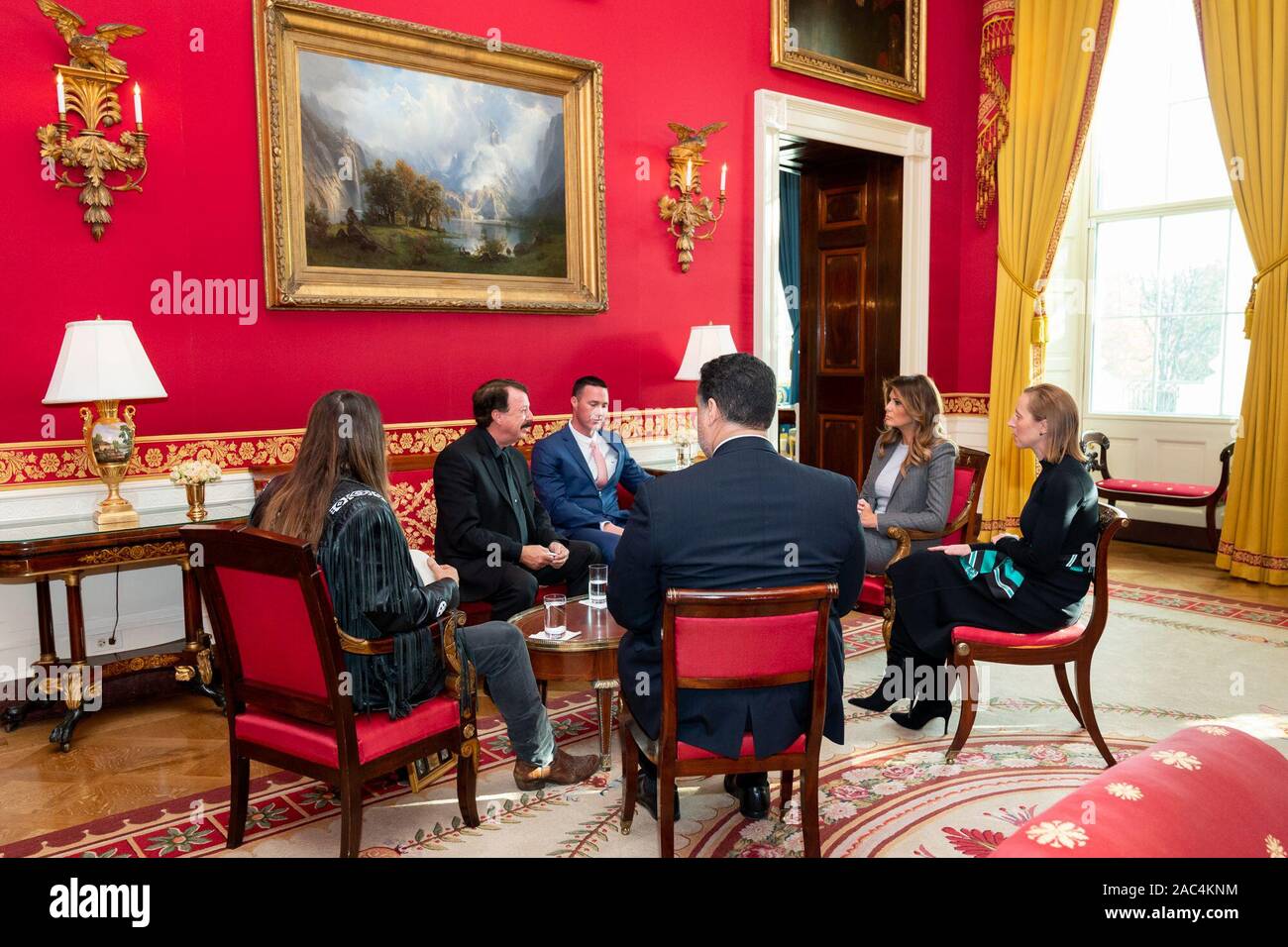 First Lady Melania Trump meets with musician Billy Ray Cyrus and David and Joshua Smith, the family of 16 year-old Channing Smith, to discuss cyber bullying and online safety Monday, Nov. 18, 2019, in the Red Room of the White House. Channing died by suicide in September after a cyber bullying incident. Stock Photo