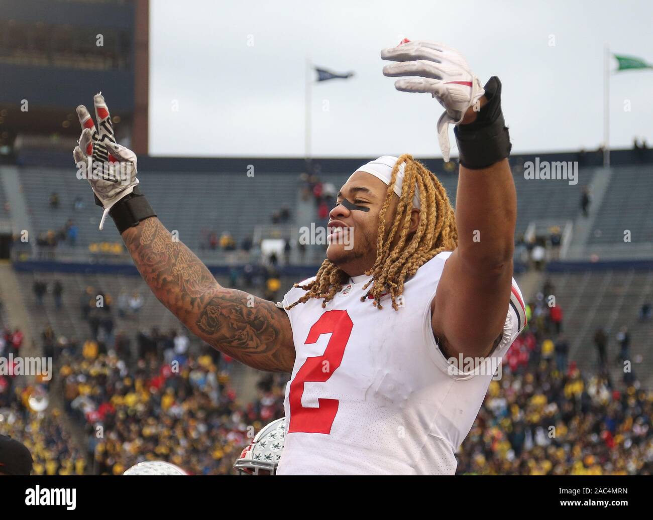 Ann Arbor, United States. 30th Nov, 2019. Ohio State Buckeye's Chase Young (2) celebrates after the Buckeyes defeated the Michigan Wolverines Saturday, November 30, 2019 in Ann Arbor, Michigan. Photo by Aaron Josefczyk/UPI Credit: UPI/Alamy Live News Stock Photo