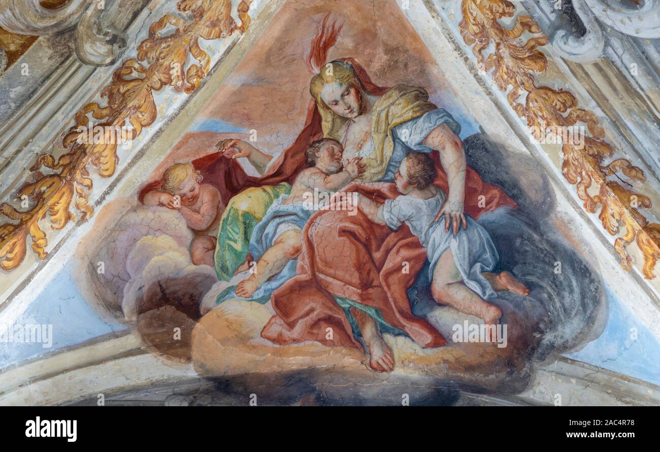 CATANIA, ITALY - APRIL 7, 2018: The fresco of Cardina Virtue of Love in church Chiesa di San Benedetto by Sebastiano Lo Monaco (1750 - 1800). Stock Photo