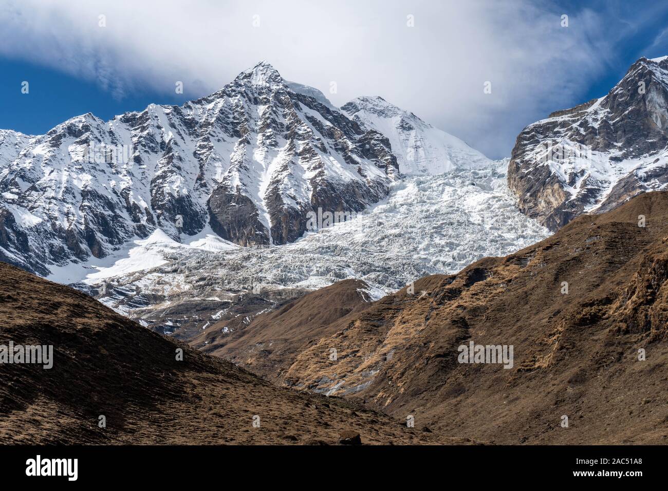 Close up of Dhaulagiri icefall. Snow capped mountain with glacier flowing from top. Nepal Stock Photo