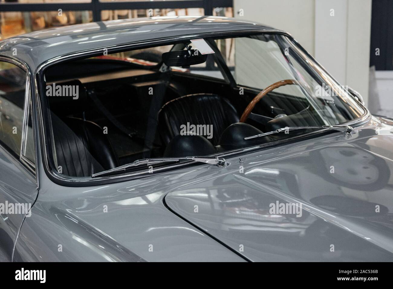 SINSHEIM, GERMANY - OCTOBER 16, 2018: Technik Museum. Hood and top. Particle view of the silver colored luxury car that stands indoors at exhibition Stock Photo