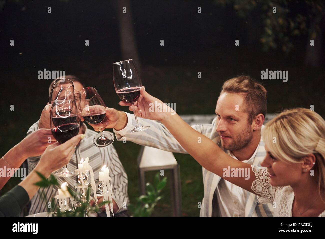 Party all night. Friends have meeting at evening. Nice outside restaurant Stock Photo