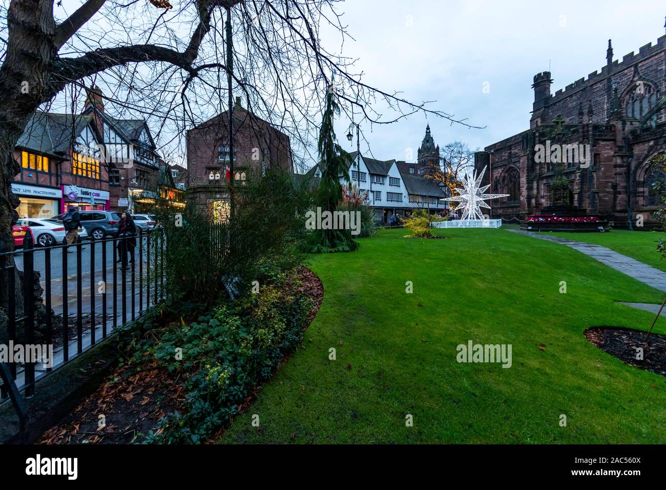 An illuminated Christmas decoration in the shape of a star in the