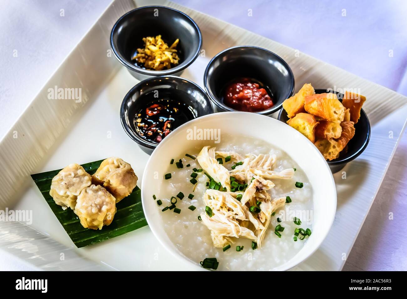 Xifan Rice chinese rice porridge with shredded chicken and spring onions with ...
