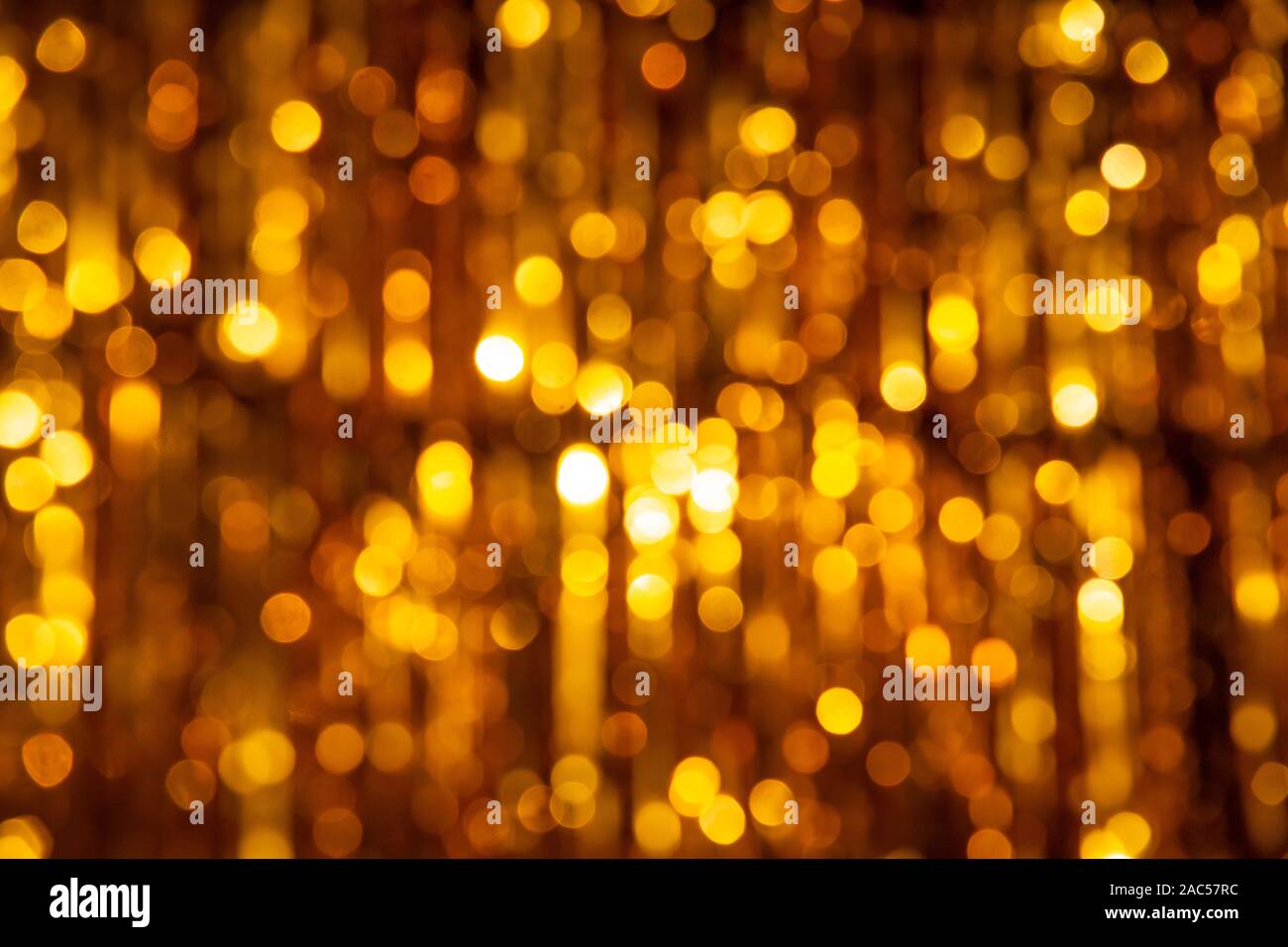 Golden background bokeh with round shape glittering Stock Photo - Alamy