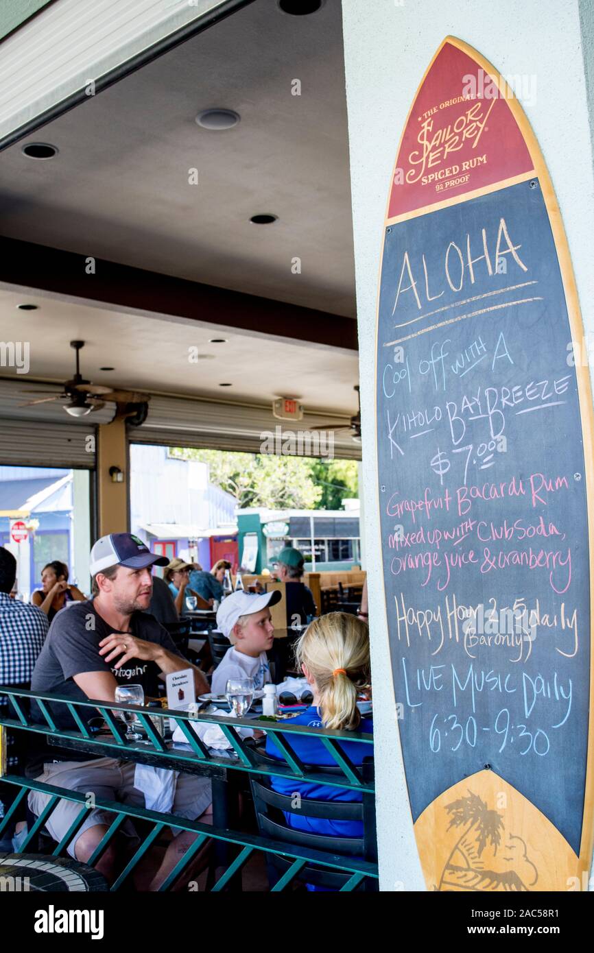 A family has a meal at Pineapples restaurant in downtown Hilo, Big Island of Hawai'i; a daily