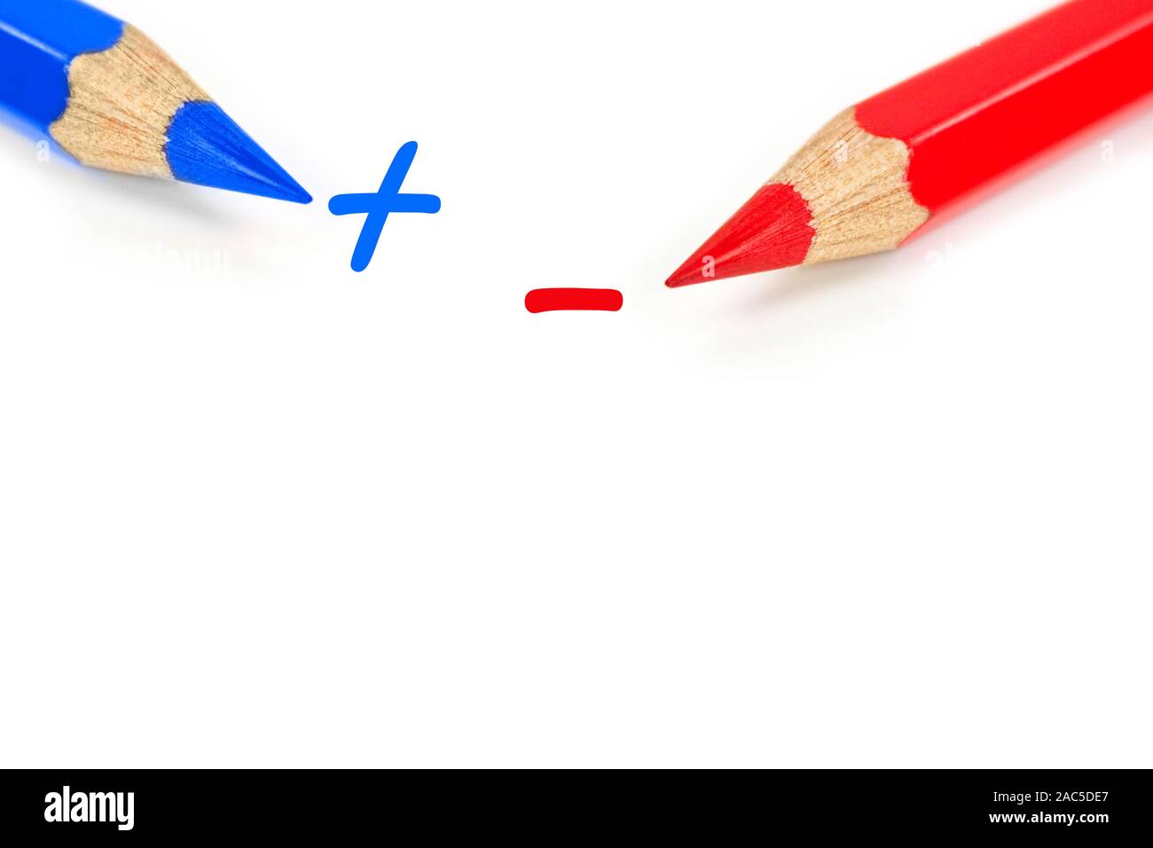 Red and blue pencil on white background Stock Photo