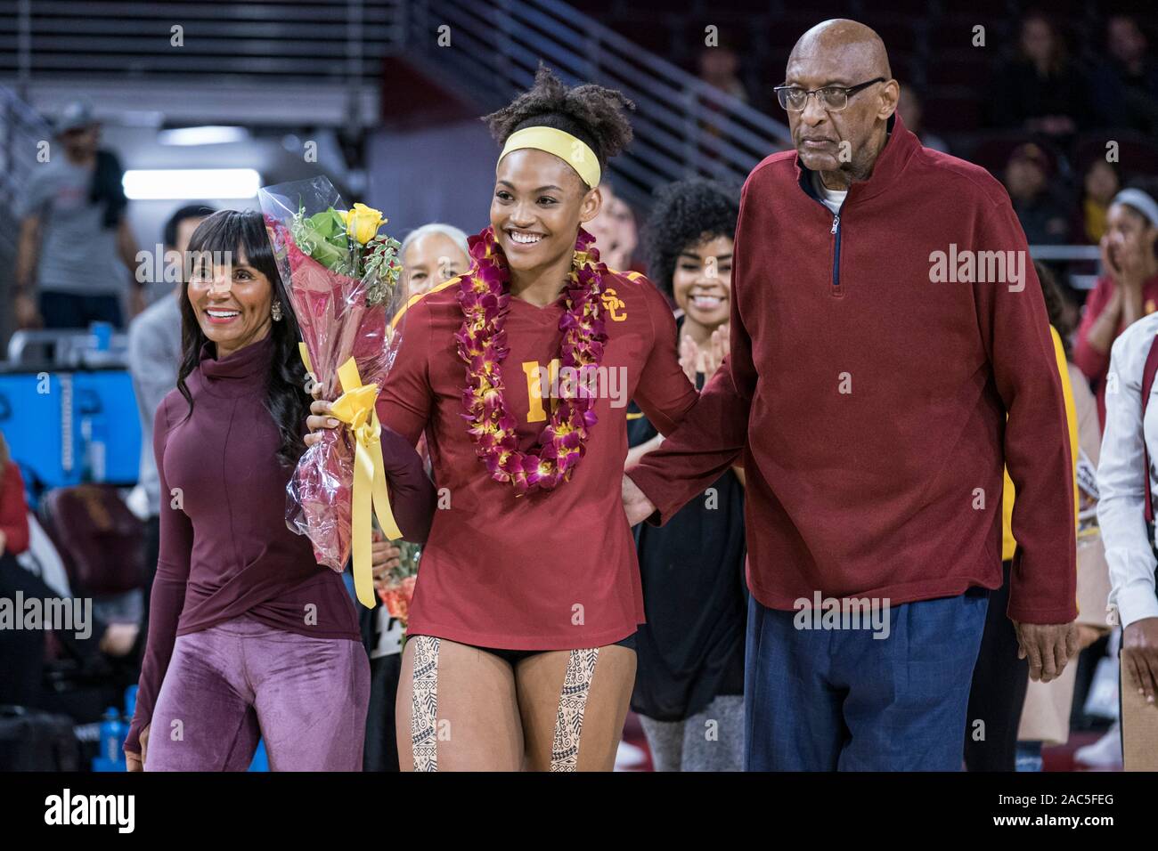 Los Angeles, United States. 27th Nov, 2019. Southern California Trojans  Khalia Lanier (16) with father Bob Lanier and Rose Lanier during senior day  against the UCLA Bruins during an NCAA women's volleyball