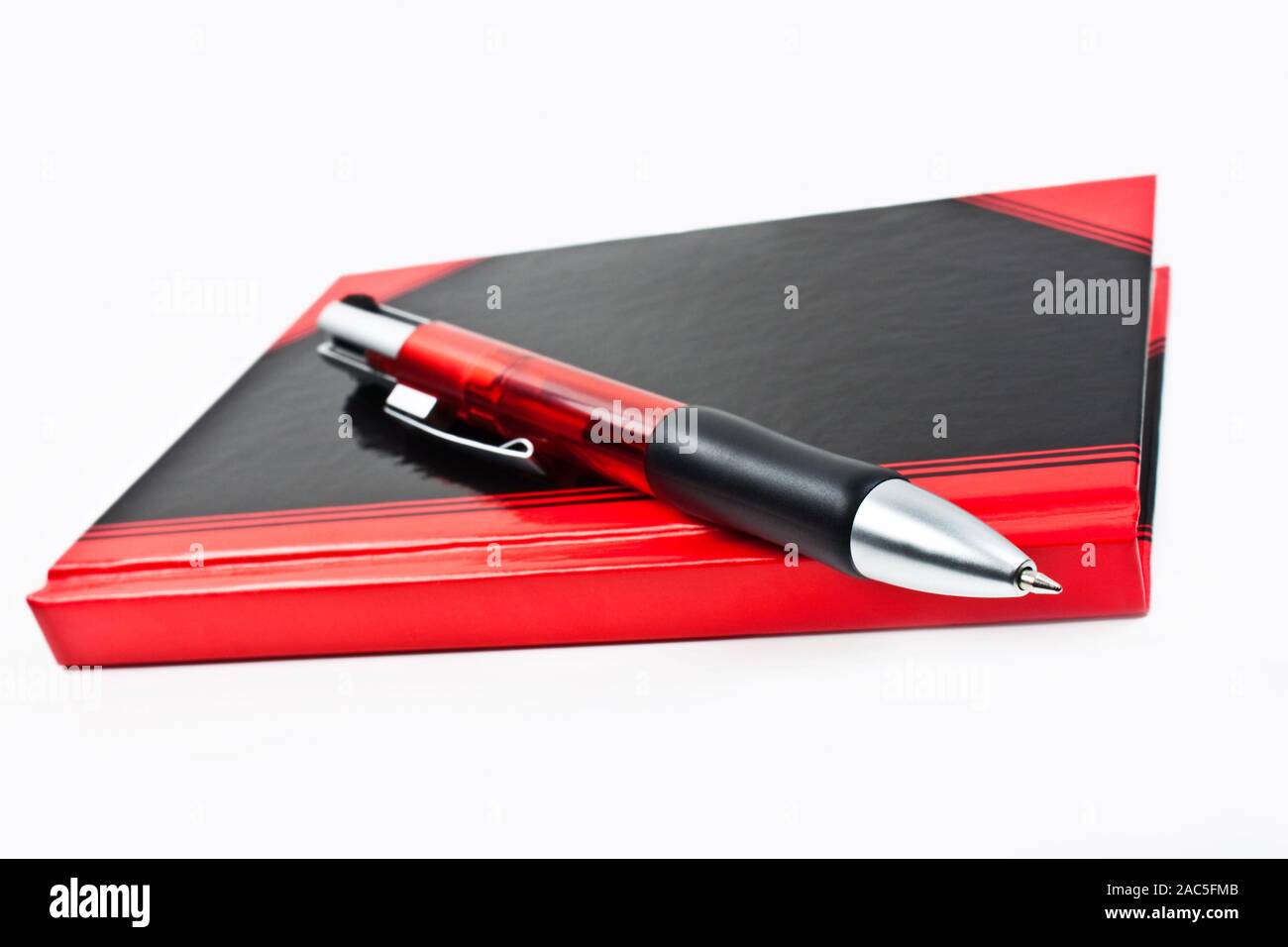 Paper notebook and pencil close up Stock Photo