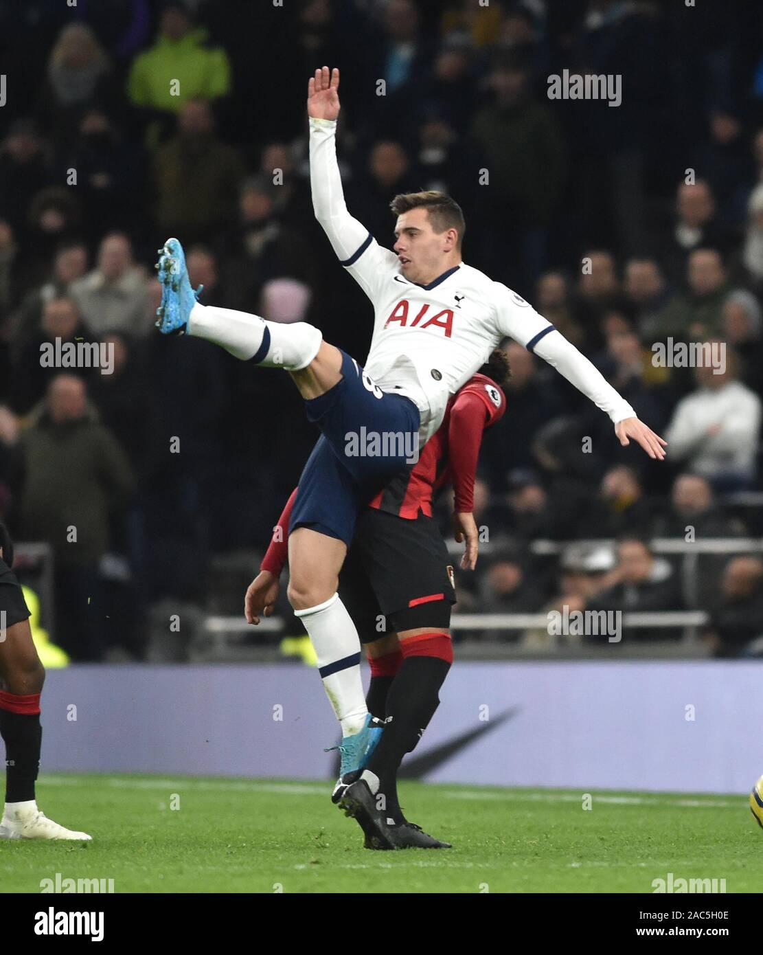 Giovani Lo Celso of Spurs battles for the ball during the Premier League match between Tottenham Hotspur and AFC Bournemouth at the Tottenham Hotspur Stadium London, UK - 30th November 2019 Photo Simon Dack / Telephoto Images.  -  Editorial use only. No merchandising. For Football images FA and Premier League restrictions apply inc. no internet/mobile usage without FAPL license - for details contact Football Dataco Stock Photo