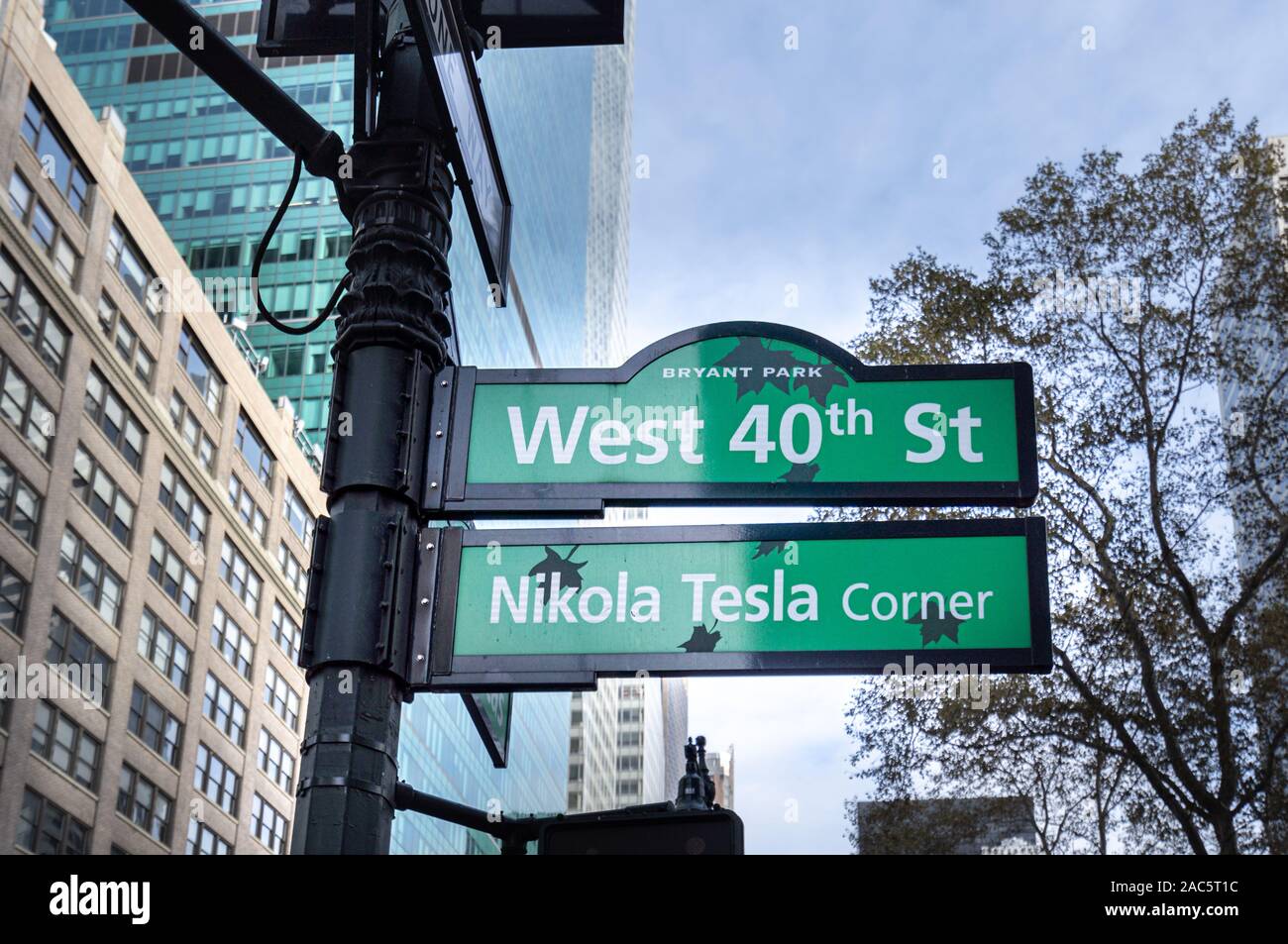 Nikola Tesla corner street sign in Bryant Park. New York City. Stock Photo