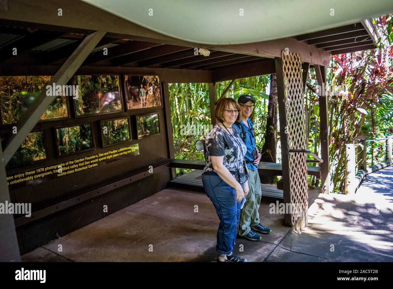 Tourists under the shelter of a covered photo exhibit at the Hawaii Tropical Botanical Garden, Papa'ikou, Big Island of Hawaiʻi. Stock Photo