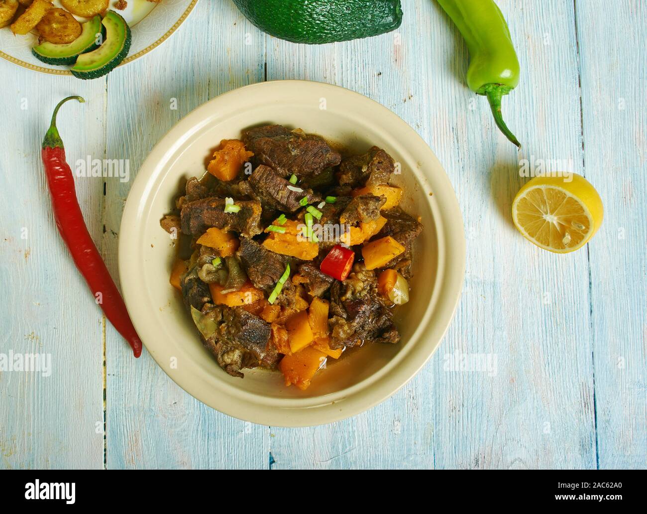 Guyanese, Pepperpot, meat stew, Caribbean cuisine, Traditional assorted dishes, Top view Stock