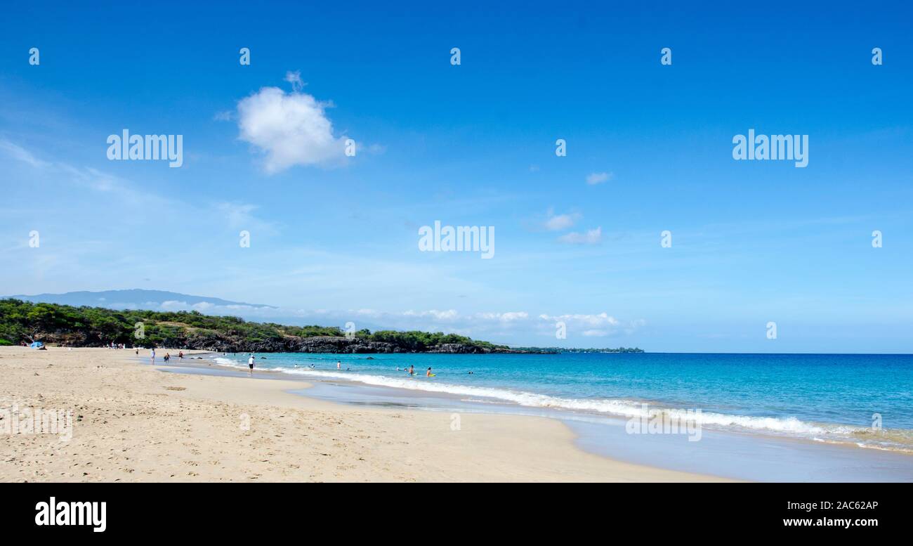 Hapuna Beach, along the Big Island of Hawai'i's Kohala Coast with Hualalai mountain in background. This white sand beach has been rated one of the bes Stock Photo